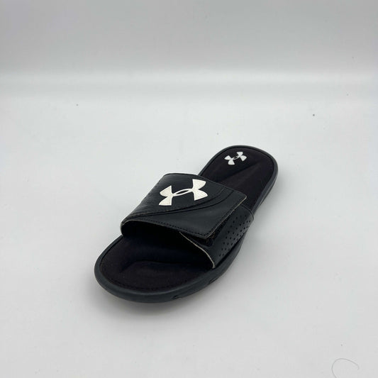 Under Armour athletic slides featuring an adjustable logo strap and plush memory foam cushioning
