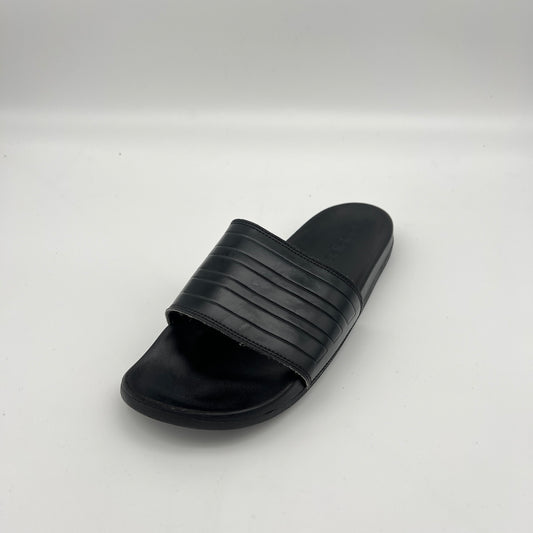 Monochromatic black adidas athletic slides featuring a cushioned Cloudfoam footbed.