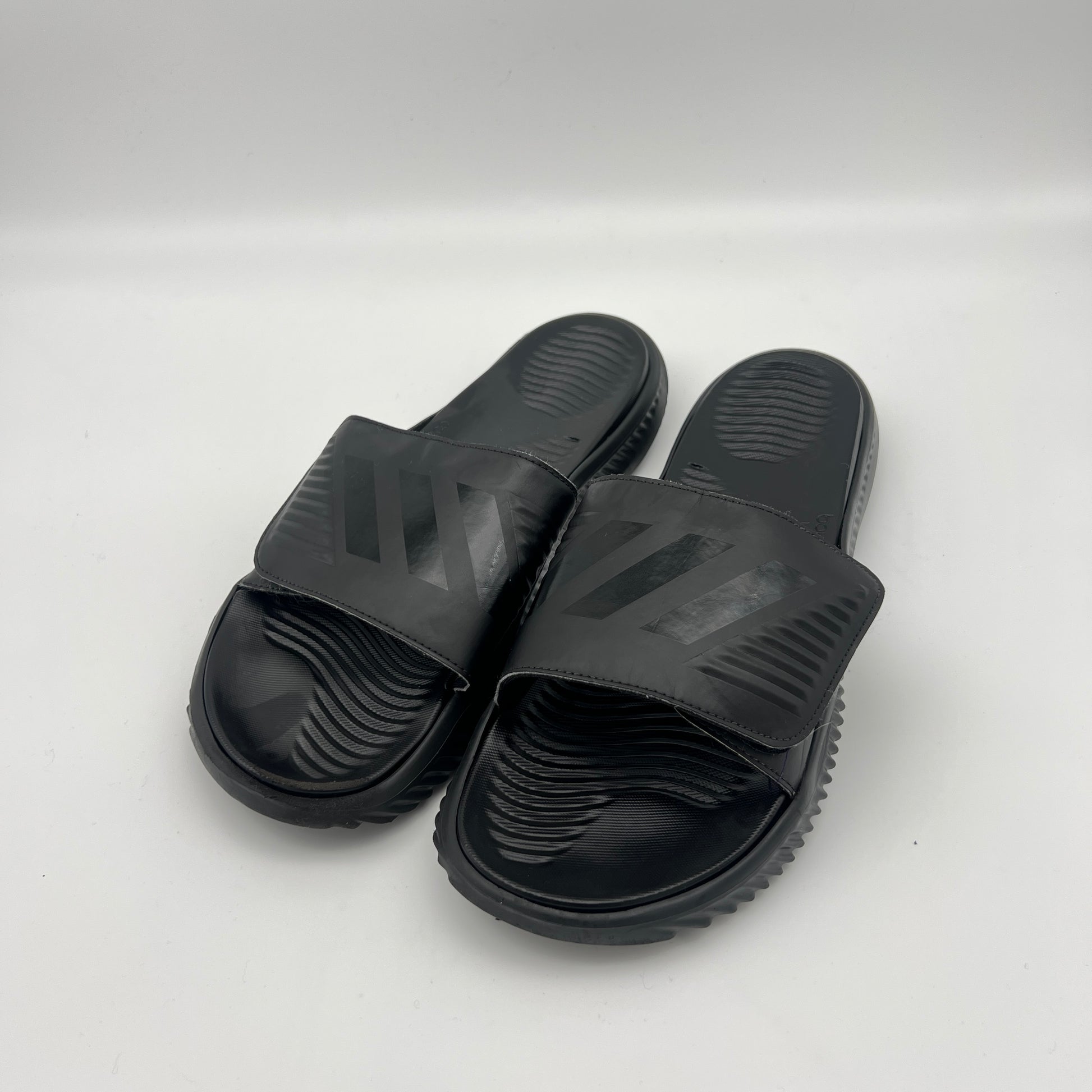 Pair of black slides on a white background