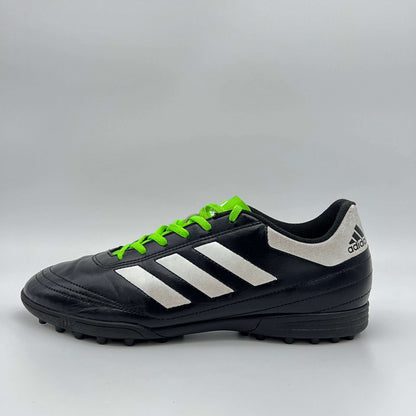 Side view of black Adidas Goletto VI TF soccer shoe with white stripes and green laces