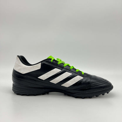 Side view of black Adidas Goletto VI TF soccer shoe with white stripes and green laces