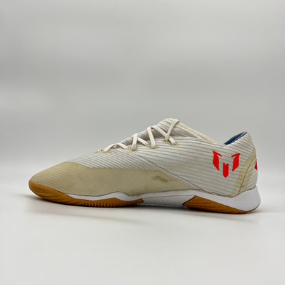 Side view of white Adidas Nemeziz Messi 19.3 indoor soccer shoe with red stripes