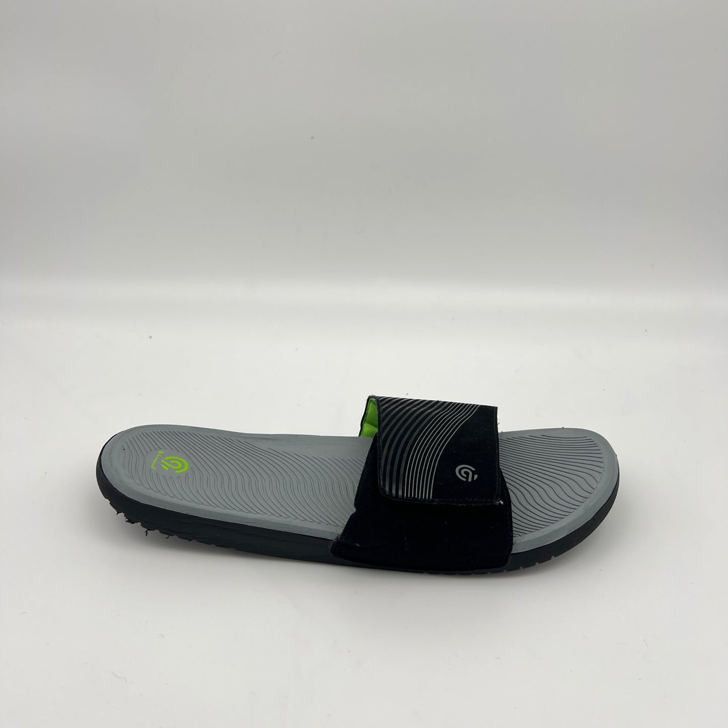 Side view of C9 Champion Jerry Slide sandal in gray and black with a contoured footbed.