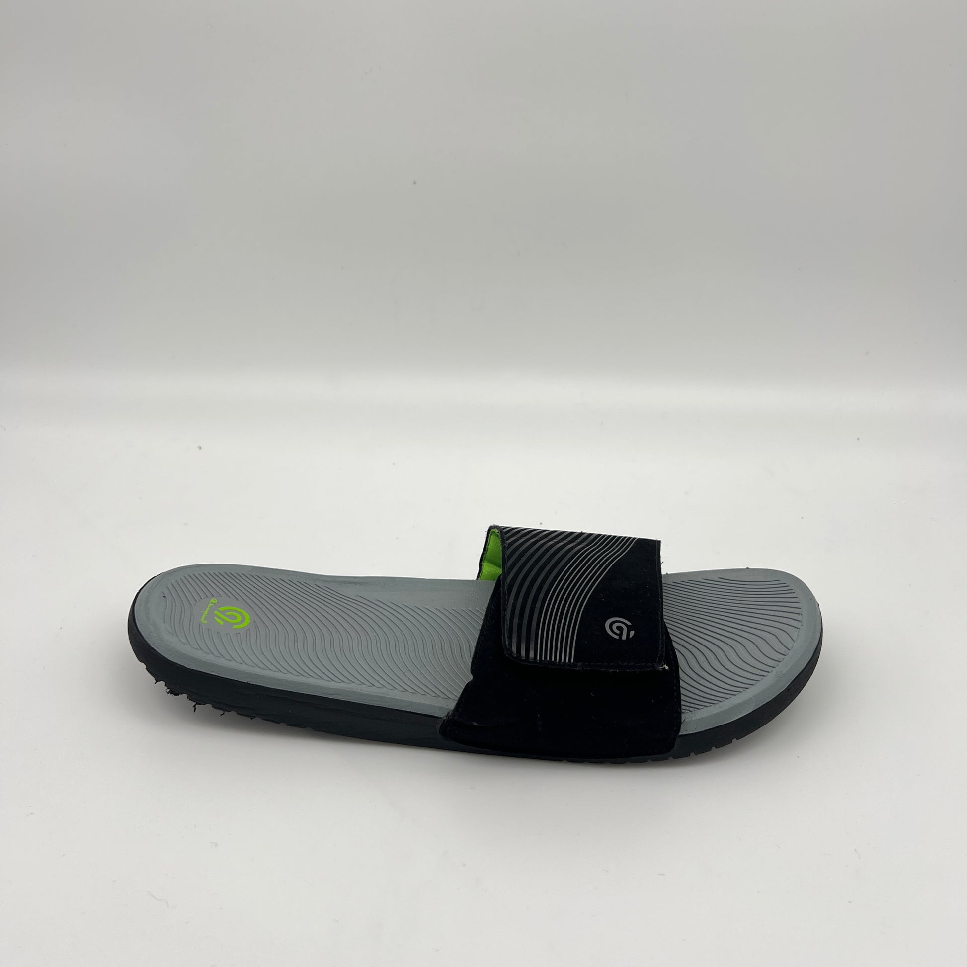 Side view of C9 Champion Jerry Slide sandal in gray and black with a contoured footbed.
