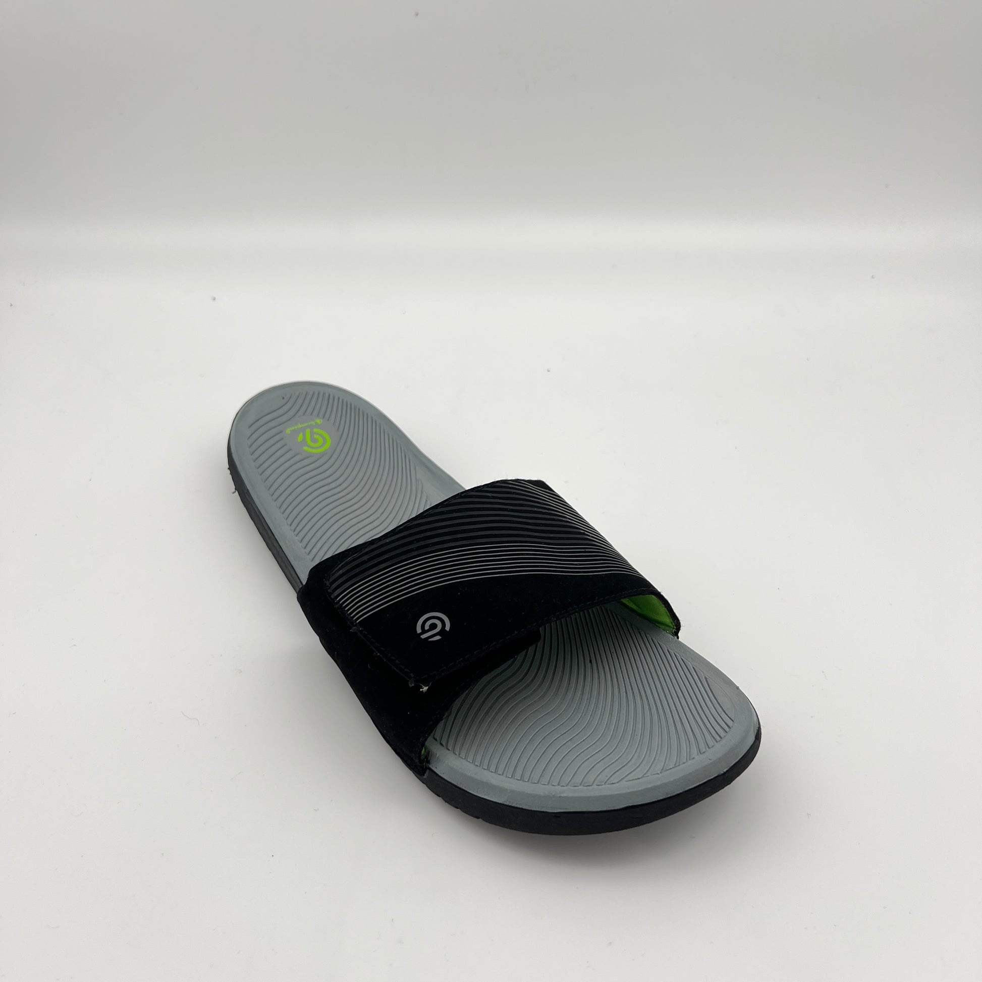 Men's C9 athletic slides featuring a gray textured sole and black patterned bandage strap.
