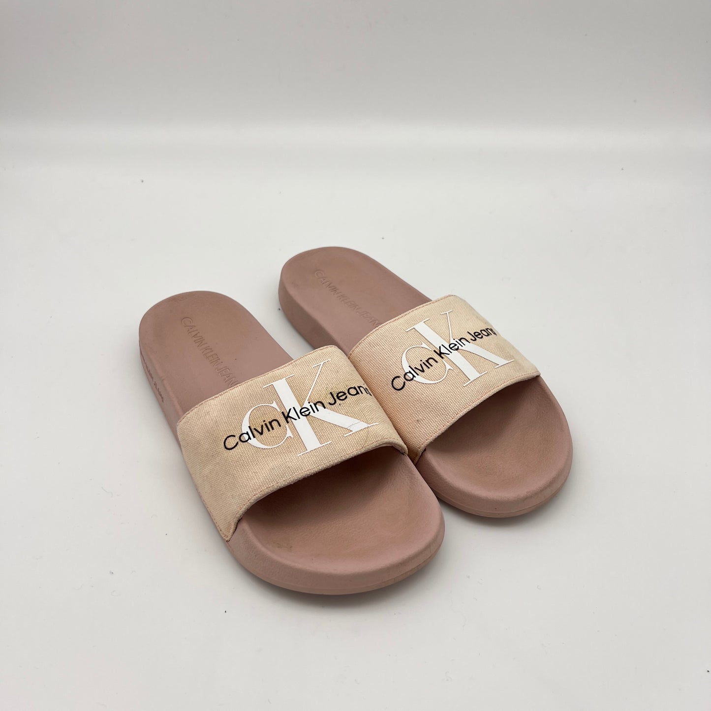 Lightweight Calvin Klein Jeans sandals in pink with a comfortable, contoured rubber sole