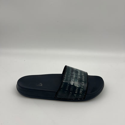 Navy blue Fila Drifter slides with white repeating logo script.