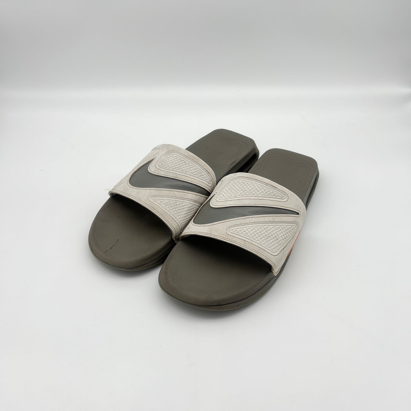 men's grey and orange Nike slides