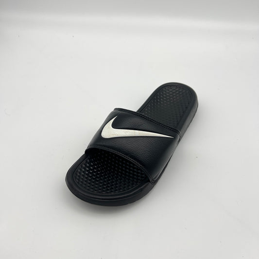 Black slide sandal with a silver logo on a white background