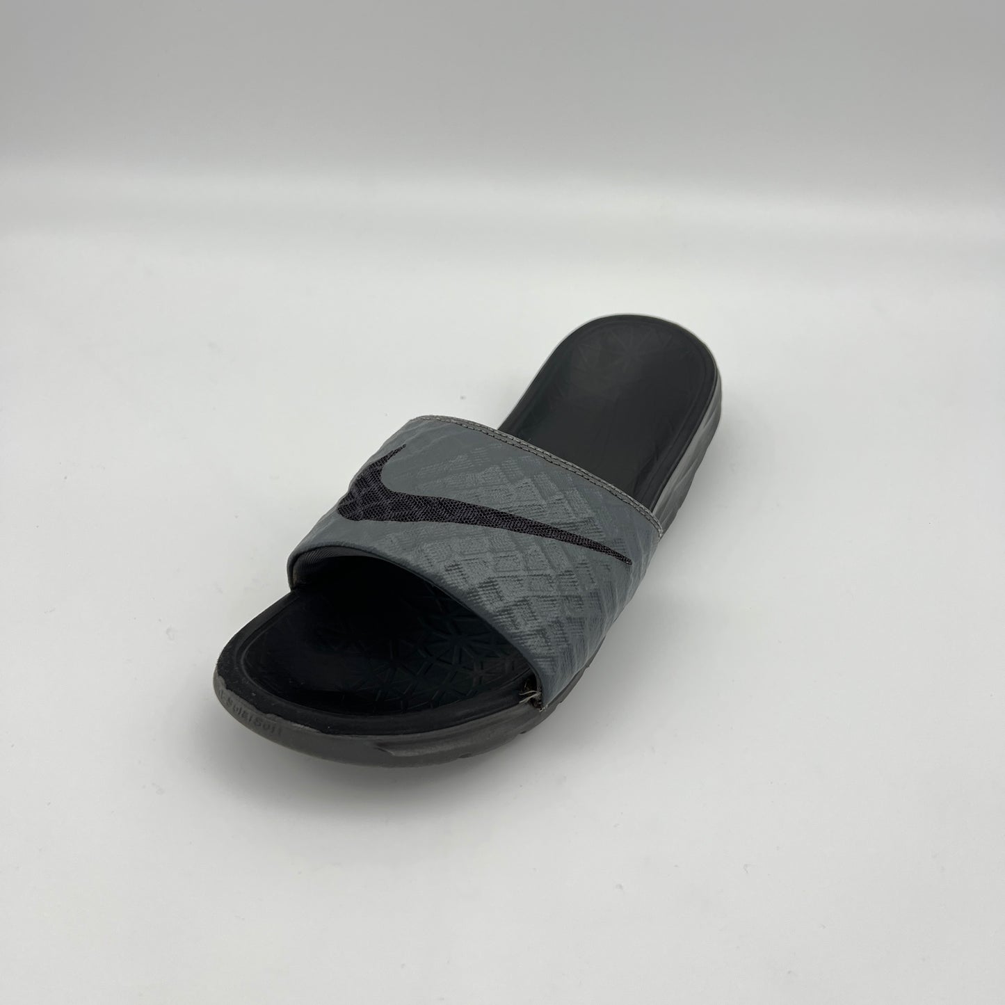 Gray slide sandal on a white background