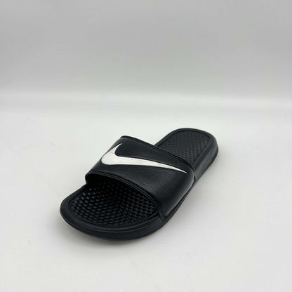 Black slide sandal with a white logo on a light gray background
