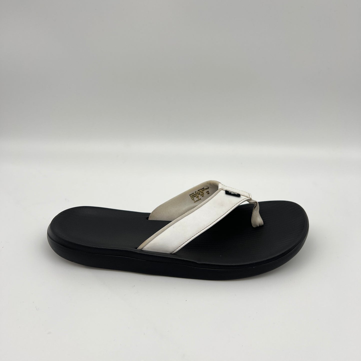 Nike Kepa Kai men's thong sandal in white and black with a wide synthetic strap and textured, cushioned footbed.