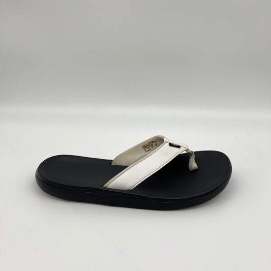 Nike Kepa Kai men's thong sandal in white and black with a wide synthetic strap and textured, cushioned footbed.