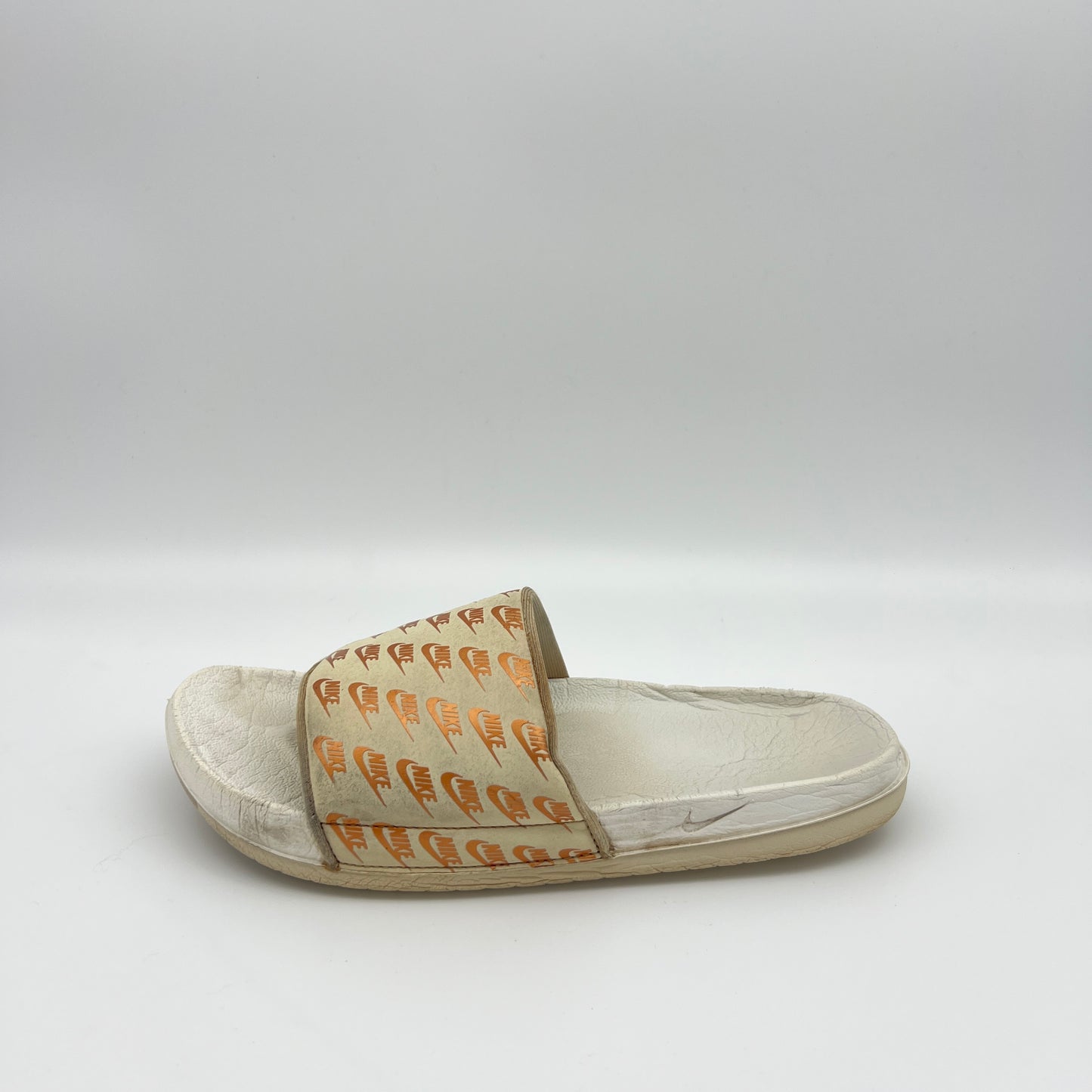Nike Offcourt or Victori One slides
