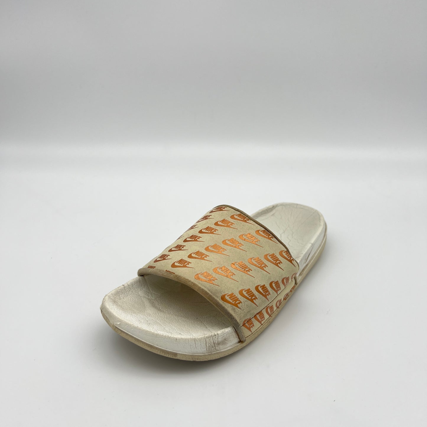 Nike Offcourt or Victori One slides