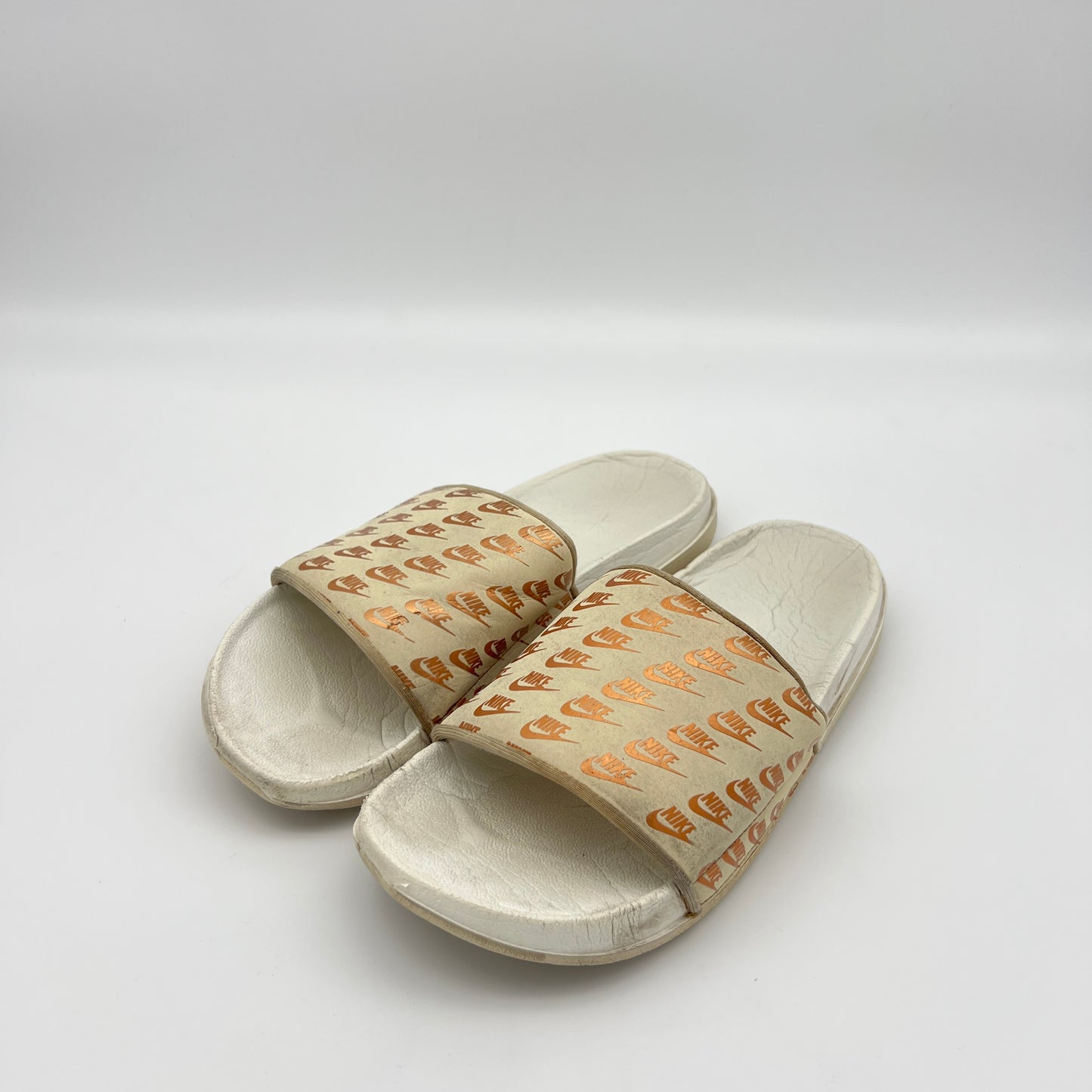Nike Offcourt or Victori One slides