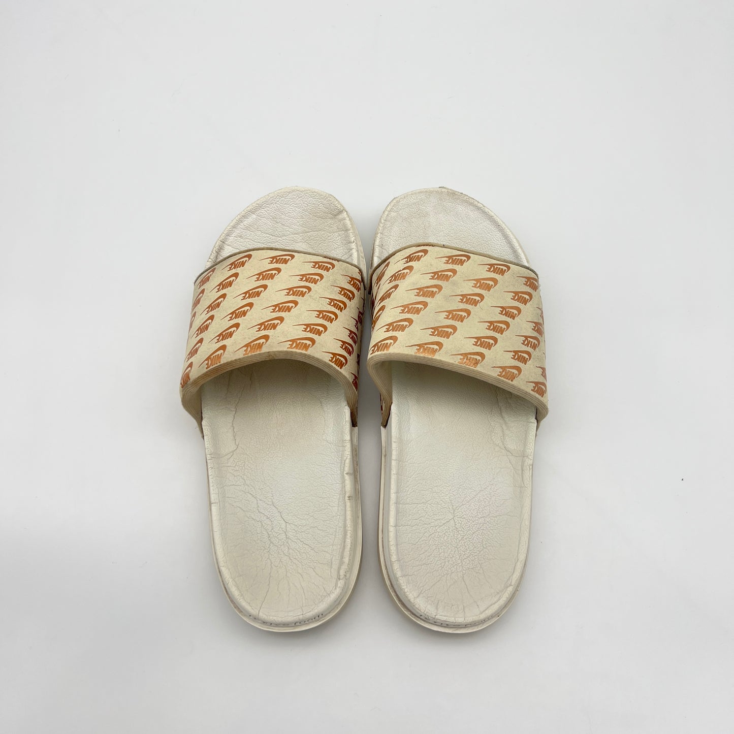 Nike Offcourt or Victori One slides