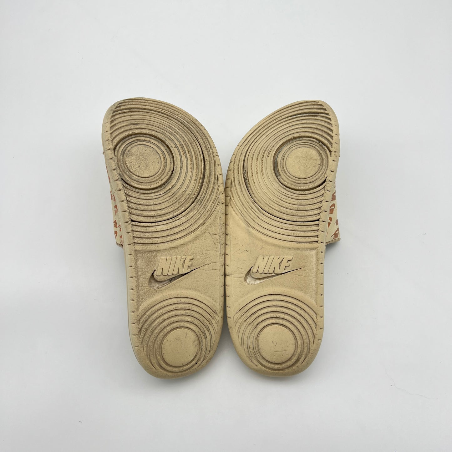 Nike Offcourt or Victori One slides