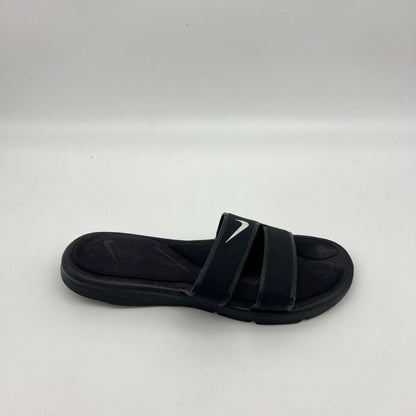 Black Nike Ultra Comfort 3 women's slide sandal with white swoosh and double strap design.