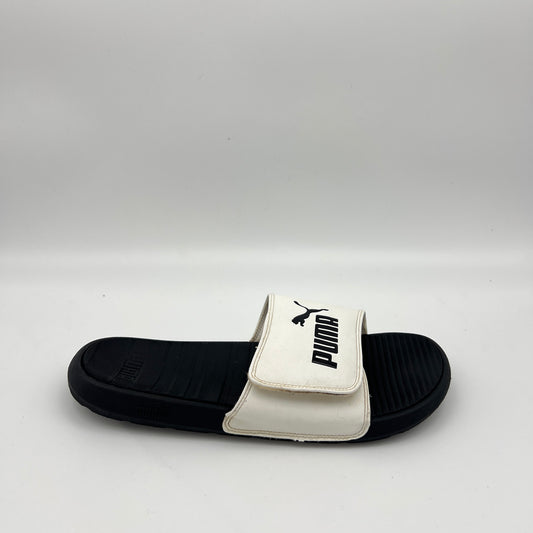 Side view of PUMA Men’s Cool Cat V Sport slide sandal in white and black.