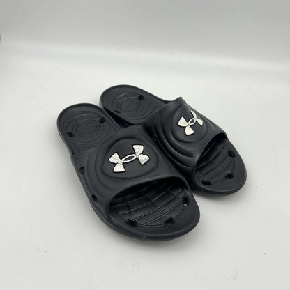 Waterproof men's locker room slides; durable black Under Armour sandals with quick-dry drainage system
