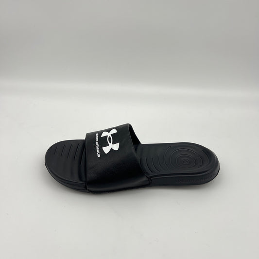 Side view of Under Armour Men's Ignite VI slide sandal in black and white with a contoured footbed