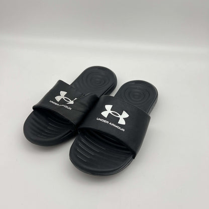 Lightweight black Under Armour sandals with a textured footbed and durable EVA outsole
