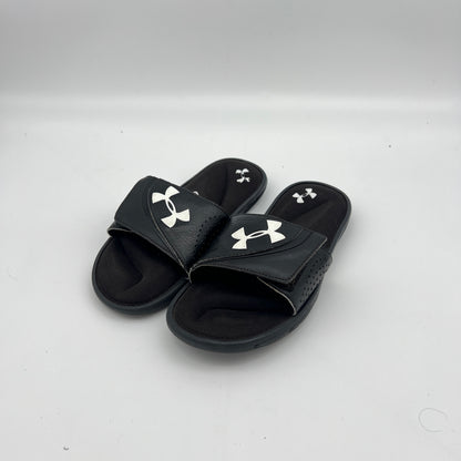 Lightweight black Under Armour sandals with a textured footbed and high-traction EVA outsole