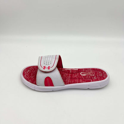 White Under Armour Ignite Pip slide with Tropic Pink heathered memory foam footbed and adjustable Velcro strap.