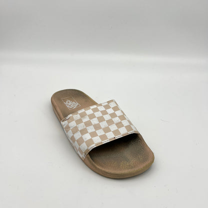 Brown slide sandal with a checkered strap on a white background