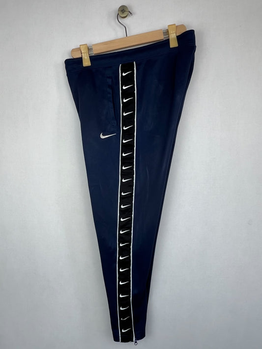 Nike Sportswear Men's Navy Blue Swoosh Taped Track Pants
