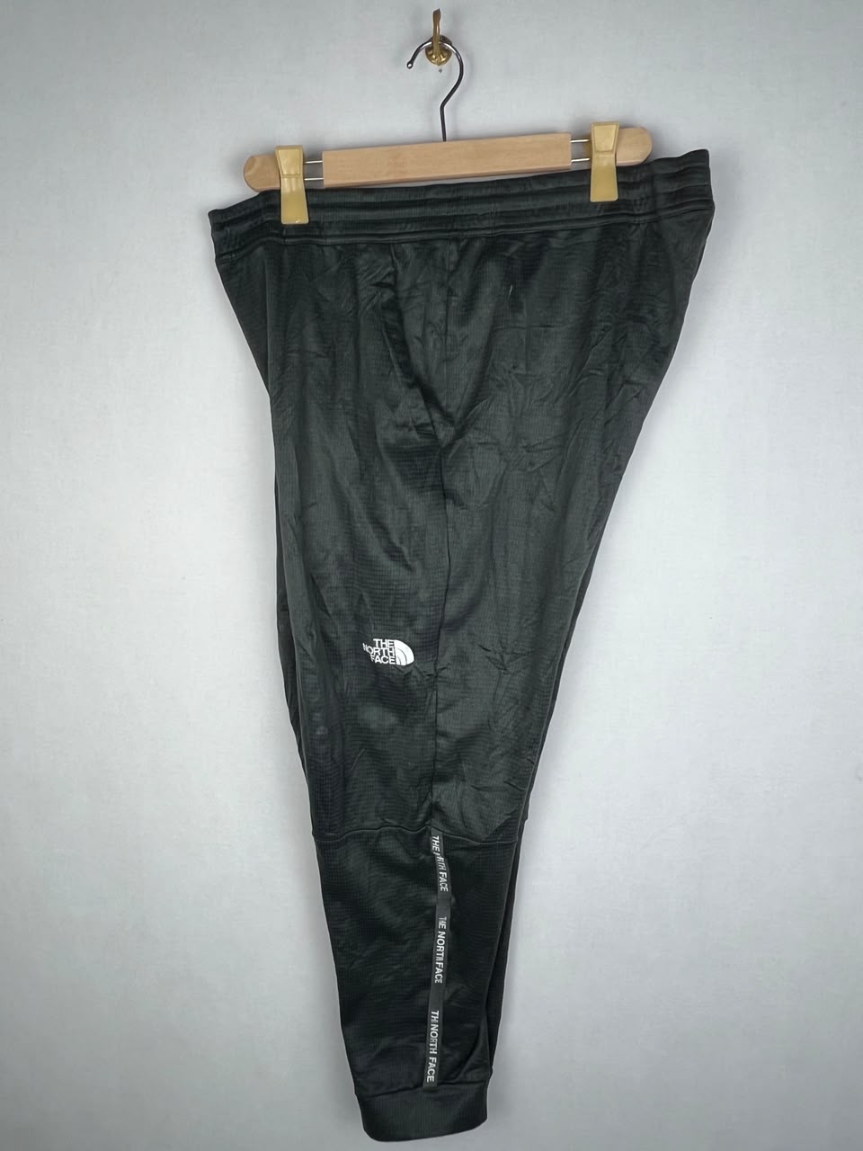 The North Face Men's Black Grid Fleece Logo Tape Jogger Pants