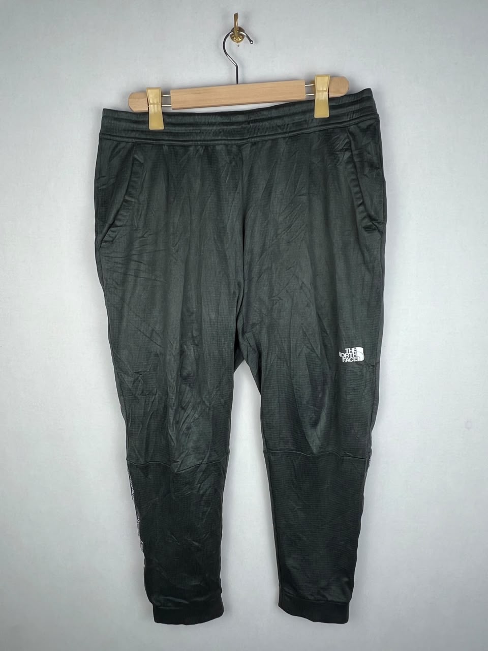 The North Face Men's Black Grid Fleece Logo Tape Jogger Pants