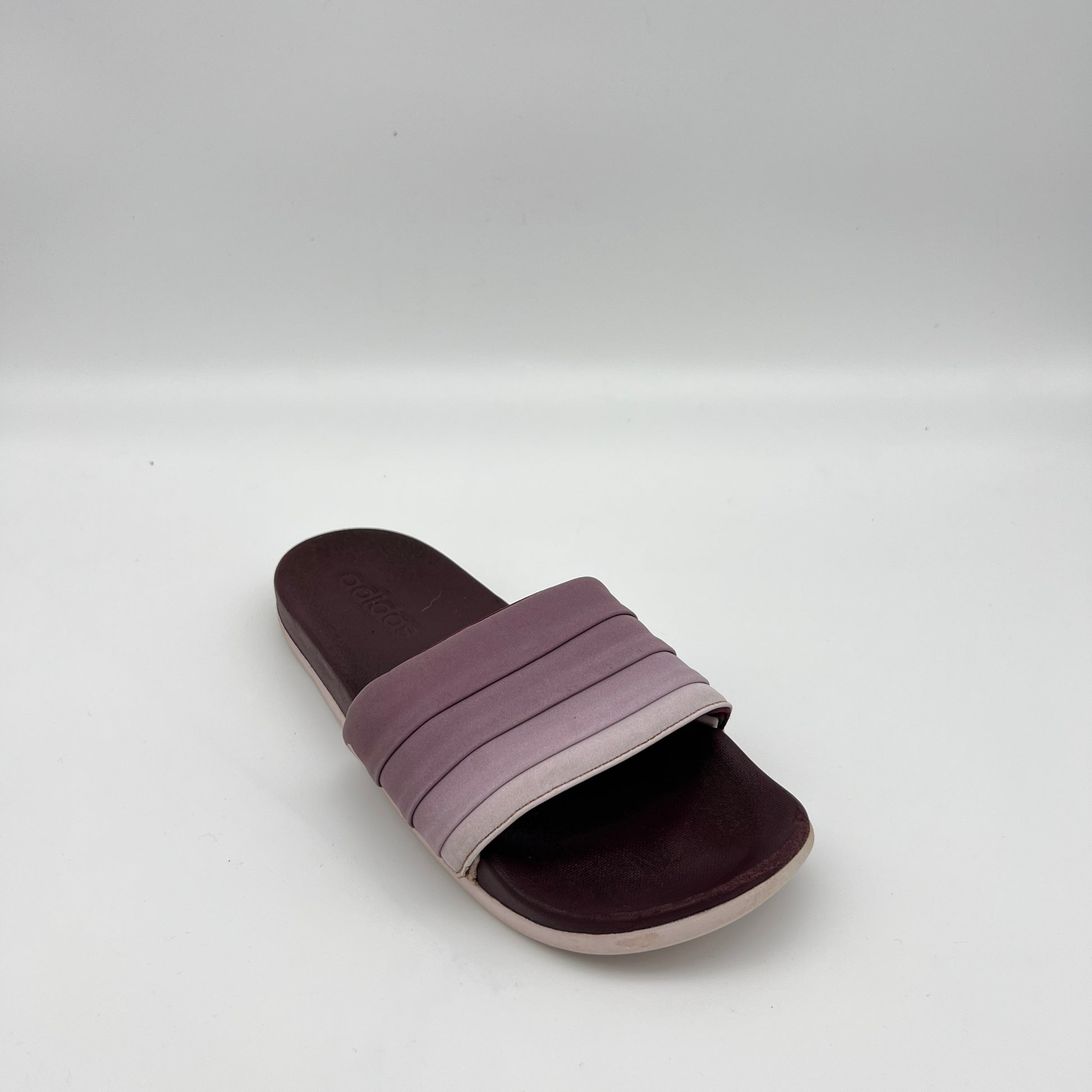 Purple slide sandal on a white background