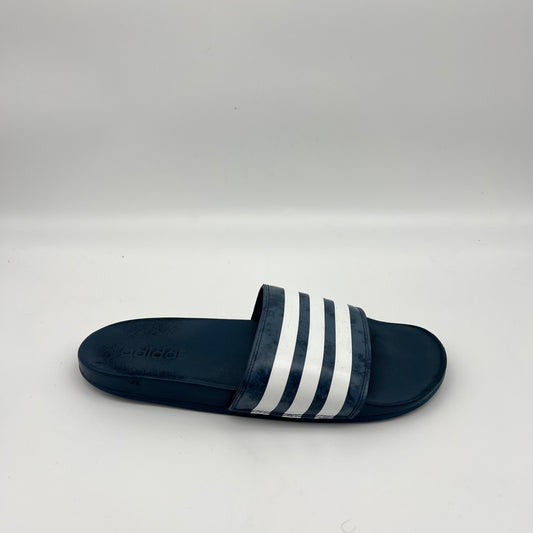 Side view of adidas Adilette Comfort slide in navy blue with marbled white 3-stripe strap
