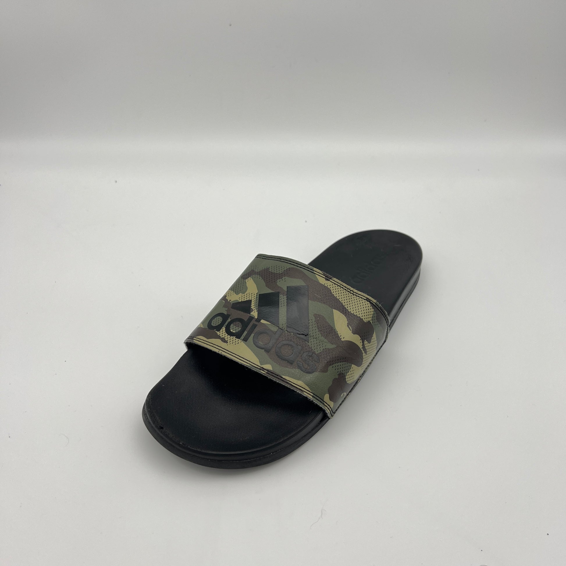 Unisex adidas slide sandals with camo-patterned strap and cushioned black