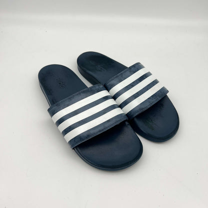 Lightweight navy adidas sandals with a contoured Cloudfoam sole and signature branding