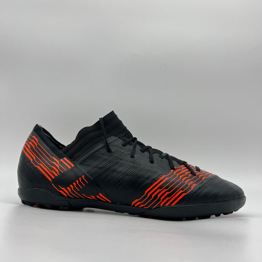 Black adidas Nemeziz Tango 17.3 TF soccer shoe with solar red agility stripes and a supportive mid-cut collar on a white background