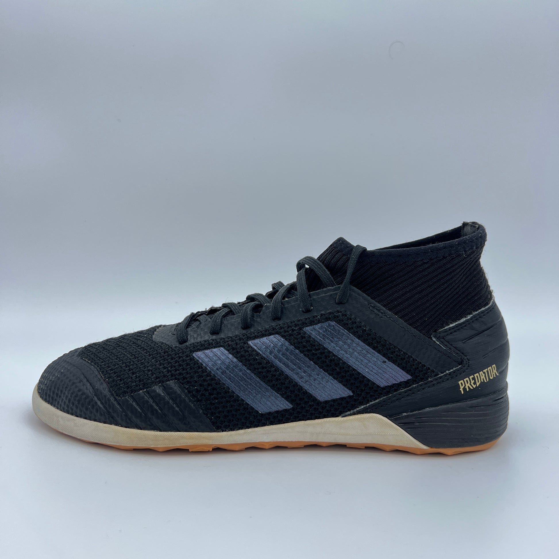 Black adidas Predator 19.3 IN indoor soccer shoe with dark grey stripes, a supportive sock-like collar, and a gum rubber outsole on a white background.